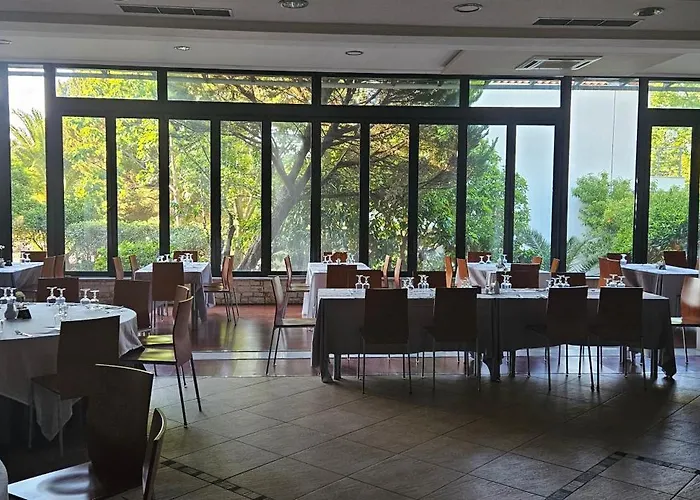 Hoteles que admiten perros en Olimpia 